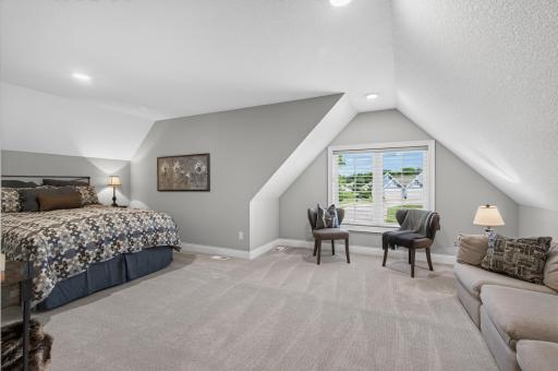 This spacious upstairs bedroom is a perfect guest suite!
