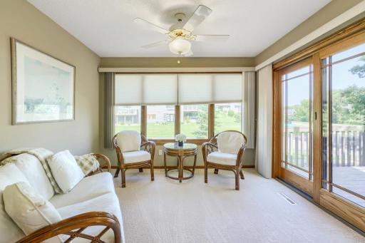 Adorable sun room with tons of light, sliding door leads to nice private deck.