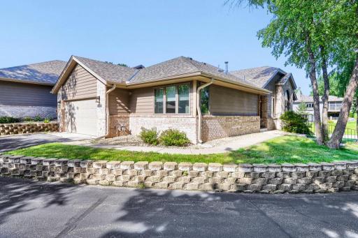 Gorgeous, quality built 3 bed, 3 bath end unit townhome with views of the golf course across the street.