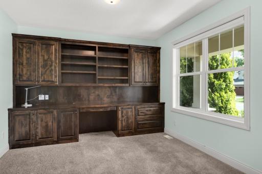 Main Floor Office with French doors. Gorgeous built ins!