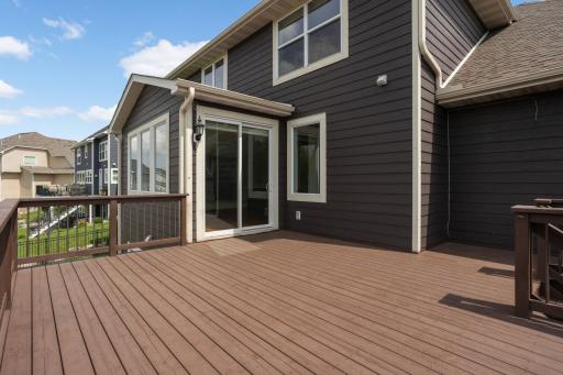 Spacious deck overlooking a fantastic backyard!