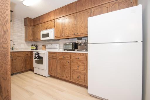 Updated tile backsplash, quartz countertops, sink and faucet
