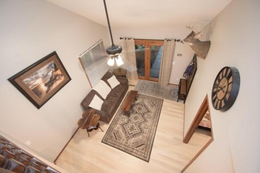 View of main level living room from loft on upper level