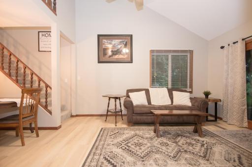 Stairway to upper level also off living room