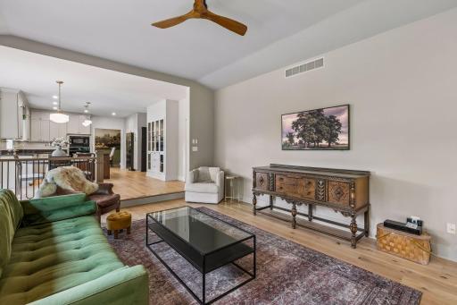 Living Room Looking into Informal Dining & Kitchen