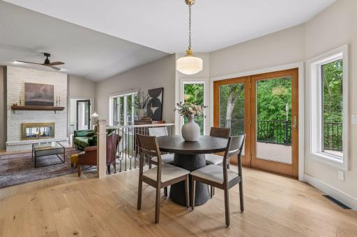 Informal Dining & Living Areas w/ Deck off of Dining Area.