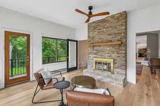 Sunroom w/ 2-Sided Fireplace & Access to Deck