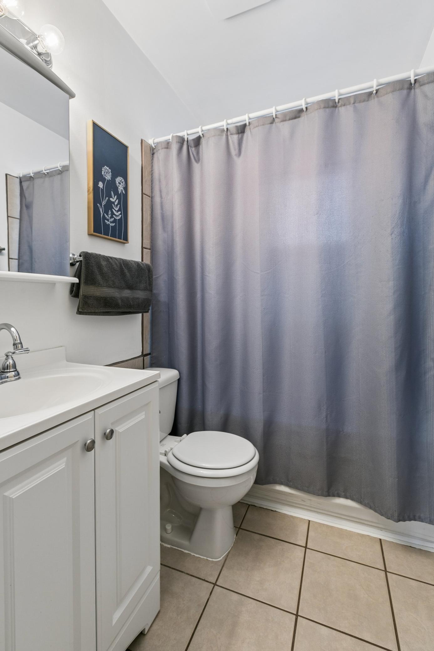 Full bath with jetted tub. New bath fan installed 2020, new stool seat in 2020.