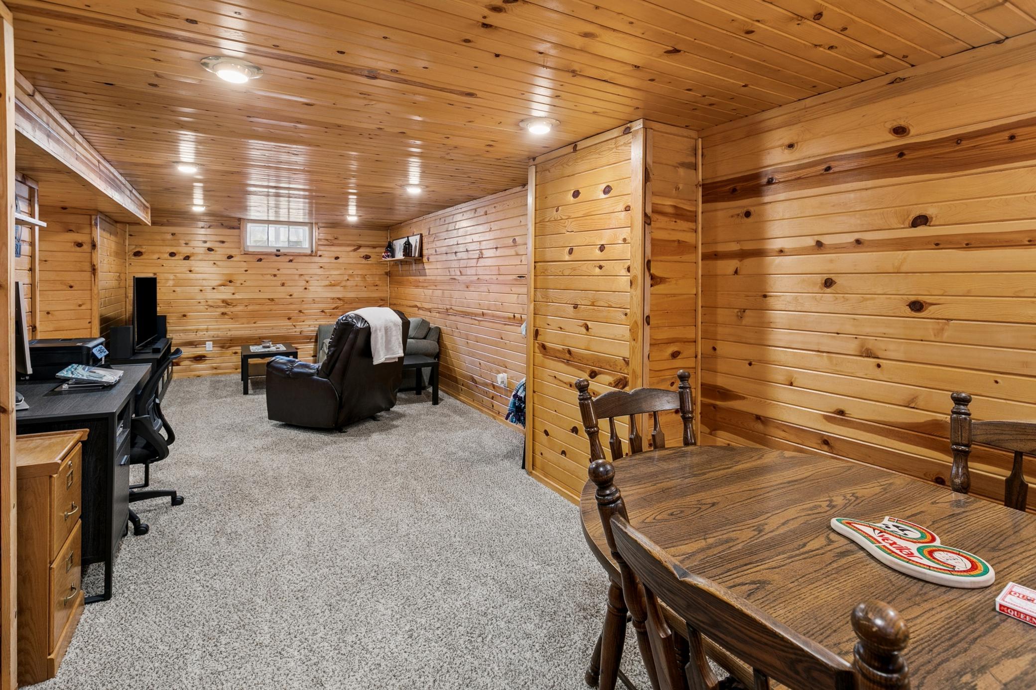The lower level extends to include more entertaining space. Could be a great play room or workout space if that's your jam.