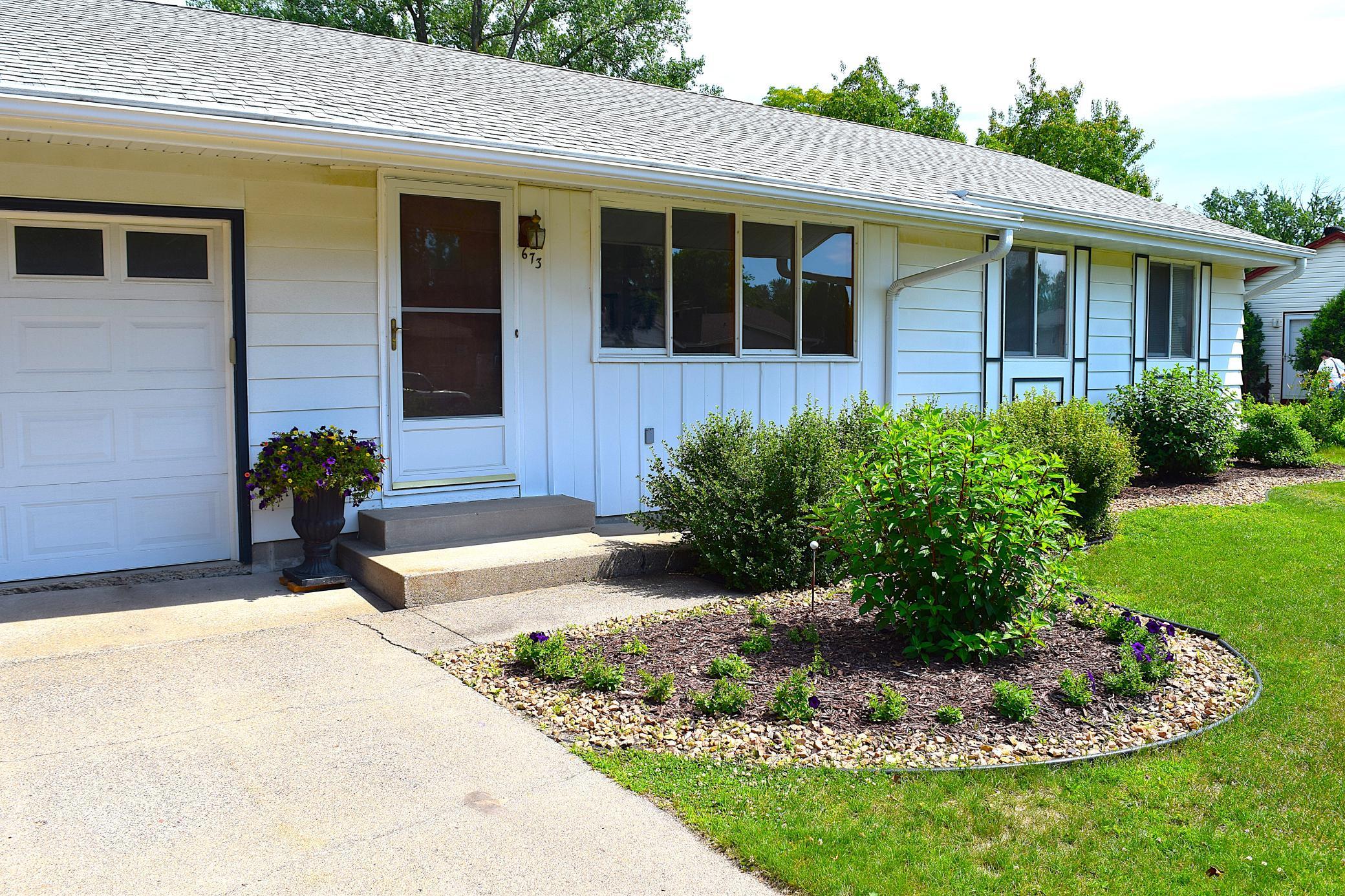 With nearly a 1/4 acre of level land, this home has great outdoor spaces including a fully fenced in backyard!