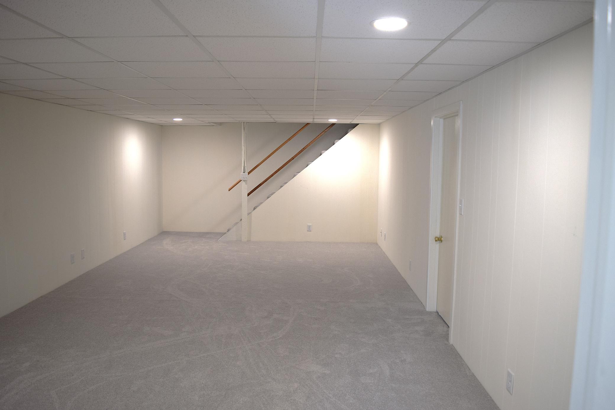 A workshop and laundry room are through the door on the right of this picture!