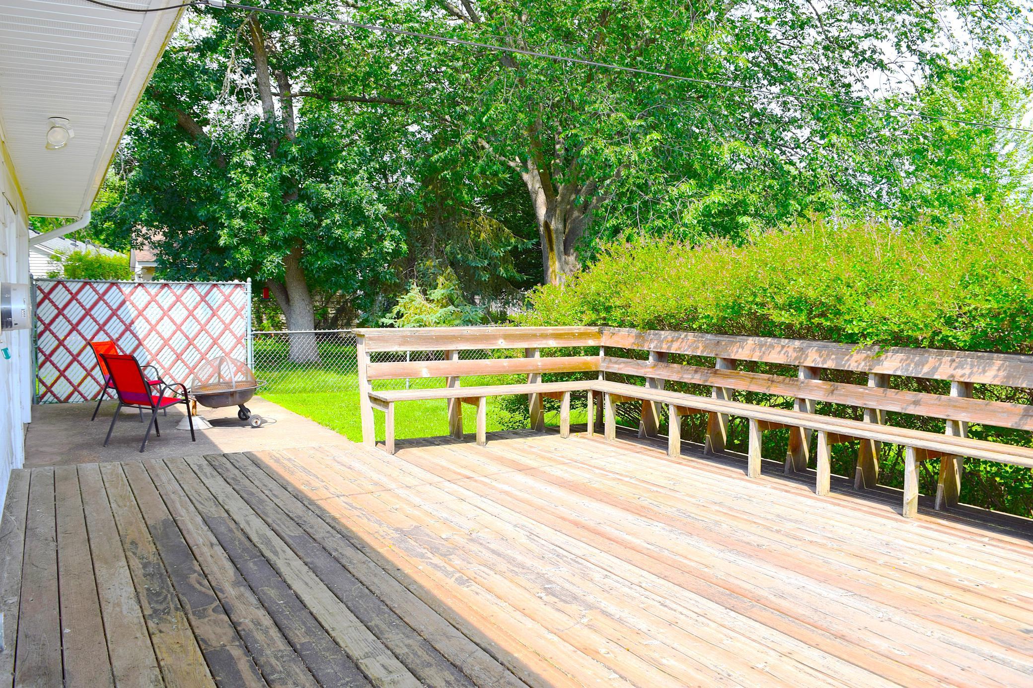 The deck overlooks the private backyard and is a great place for those summer night barbeques or to relax with a refreshing drink after a long day!