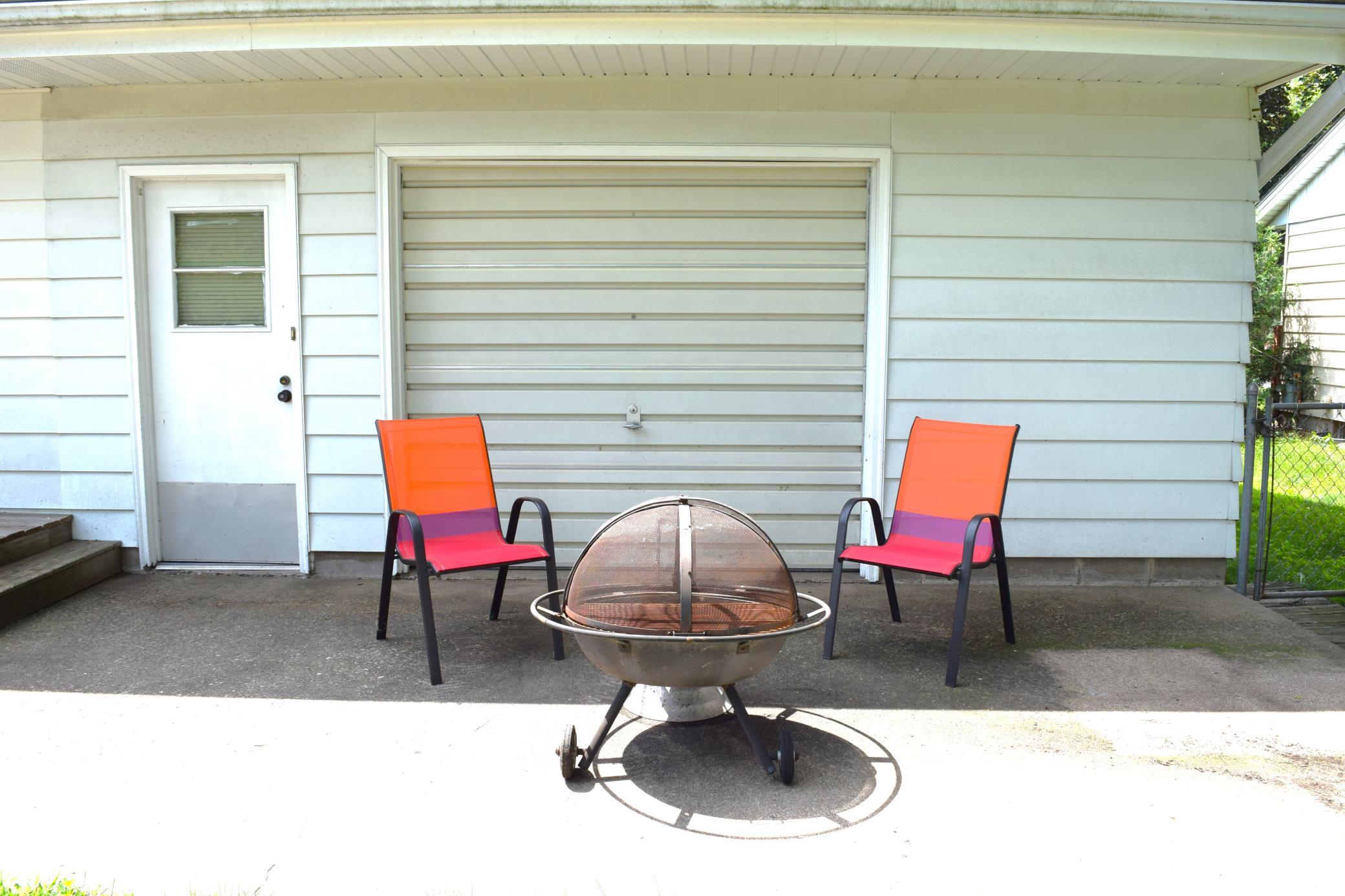 Smores anyone? The patio located just off the deck is a great place for a little camp fire and choolate treat! The single car garage door provides great access from the garage to the backyard!