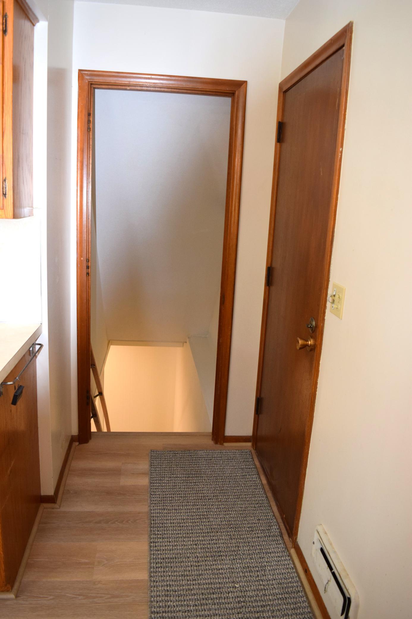 The back entry leads to the newly finished lower level. the door to the right goes to the garage! Very convenient for bringing in the groceries!