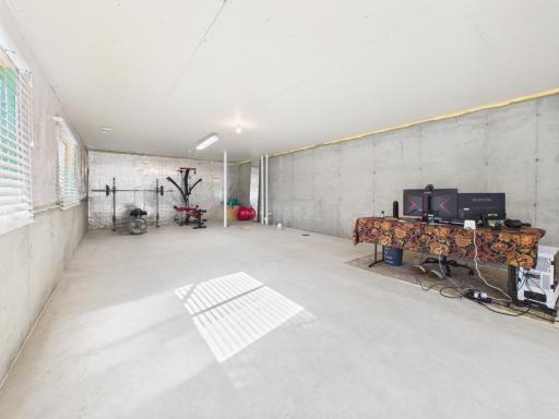 Unfinished basement with room for a bedroom and bathroom