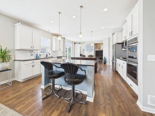 Kitchen with double island and granite counter tops