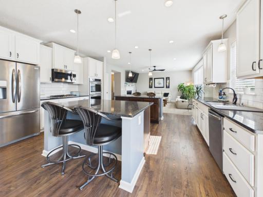Kitchen with double island and granite counter tops