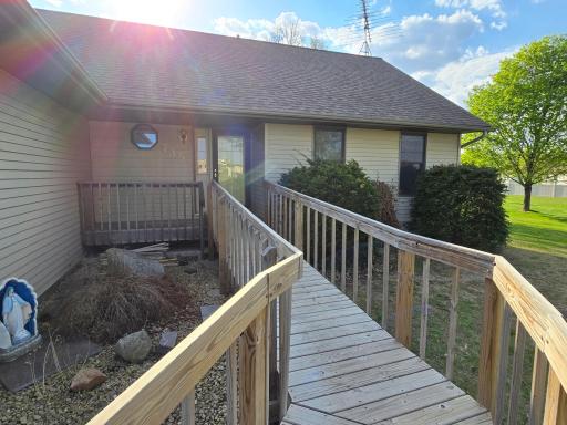 Nice porch on front of home, nicely landscaped. Ramp will be removed before closing.