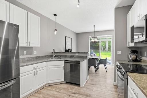 Lovely spacious kitchen with newer LG SS appliances! You'll love the storage and workspace the kitchen offers too.