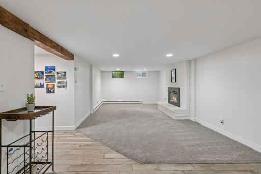 Spacious lower level with gas fireplace, full kitchen, two bedrooms + bath and another laundry room. Outstanding space for movie watching, making guests feel comfortable, or approved as an ADU for rental with City of Mpls.