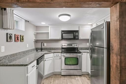 Lower level kitchen - well-appointed and would double perfectly as a wet bar, if you prefer.