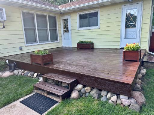 Recently Stained Deck With Doors to The Kitchen & Lower Level.