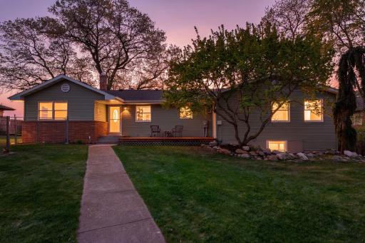Your dreamy lake home awaits! Incredible Coon Lake Rambler on beautiful .77-acre lot offering approximately 100ft of waterfront.