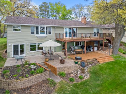 Outdoor spaces are perfection! Decks, patios with panoramic lake views!
