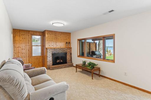 Versatile lower-level family room or amusement room with direct access to a second kitchen, providing an ideal layout for multi-generational living, extended stays, or entertaining guests.