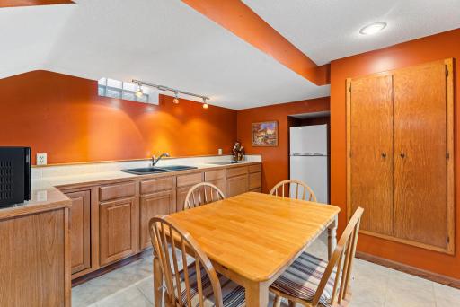 2nd kitchen or wet bar setup ideal for entertaining guests or a perfect opportunity for multi-generational living all while enjoying lake life on Coon Lake.