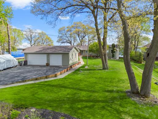 Amazing .77 acre lot featuring a detached, oversized 3+ car garage offers great parking, a ton of storage area for water toys/equipment, and a workshop/studio for hobbyist.