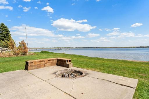 Serene, outdoor spaces include an oversized main level deck that spans the back of the home, firepit patio area, and private under deck patio â all offering dreamy, panoramic lake views and long-lasting memories.