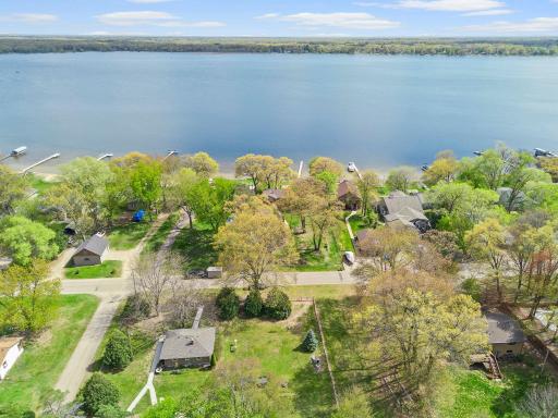 Your dreamy lake home awaits! Incredible Coon Lake Rambler on beautiful .77-acre lot offering approximately 100ft of waterfront. Known for its excellent boating, fishing, and lakeside lifestyle, Coon Lake is a favorite north metro destination.