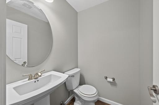 Convenient main-level powder room for guests.