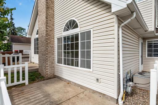 Another view of the spacious patio with direct access to the front entry and fenced outdoor space.