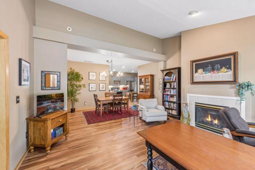 Enter into a warm and spacious Living Room and Dining Room. (Living Room used as an office by current owner.)