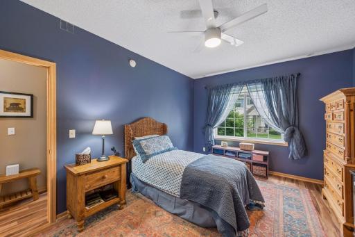 King Bed will easily fit on larger opposite wall.