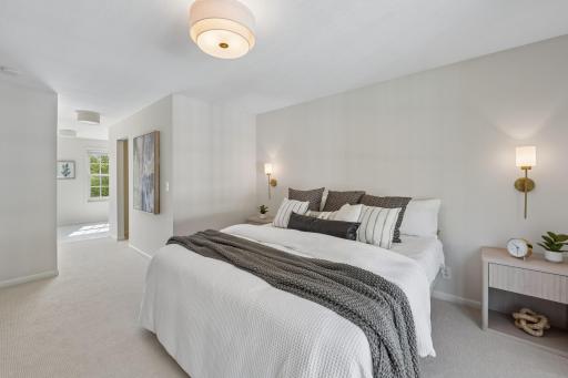Light and bright master suite with balcony and 2 walkin closets