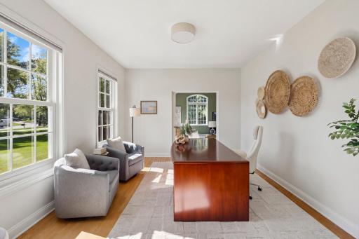 Main floor office with hardwood floors