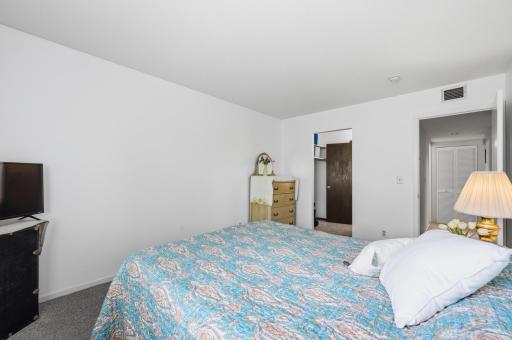 Spacious and inviting, this bedroom offers plenty of room to relax and unwind. The generous layout provides flexibility for comfortable furnishings.