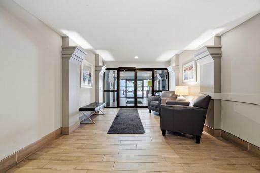 Entrance/ Lobby. Elegant simplicity and cozy seating make this welcoming entrance a perfect first impression, blending comfort, convenience, and charm