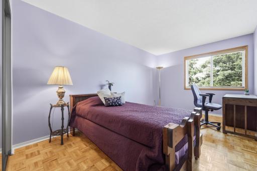 Bright and welcoming, this charming bedroom offers a peaceful retreat filled with natural light. Beautiful hardwood floors, a spacious layout create a warm and relaxing atmosphere.
