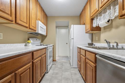 Warm, practical kitchen with a cozy, familiar atmosphere that feels welcoming and lived-in.