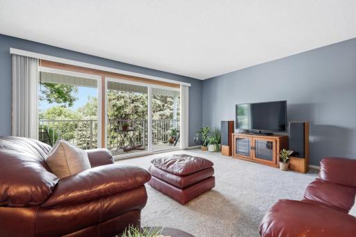 Comfortable, peaceful living room with a relaxing connection to the outdoors
