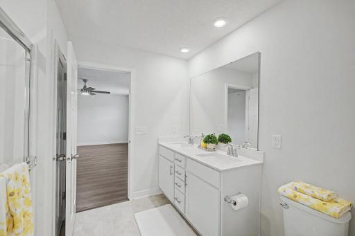 Primary ensuite bath w/double vanities