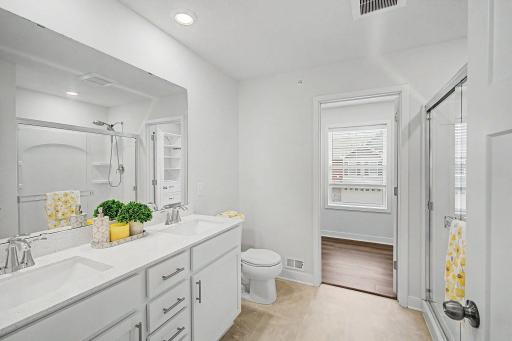 Primary ensuite bath w/walk-in closet (THREE)