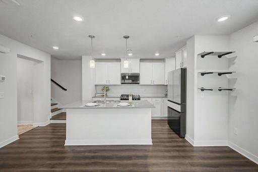 Kitchen opens to dining & living room