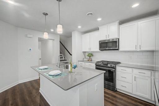 Large island anchors the kitchen