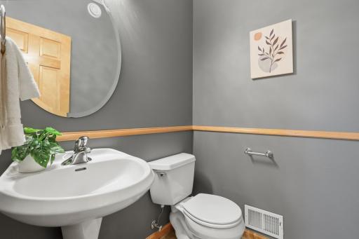Main floor powder room for added convenience for everyday living and entertaining.