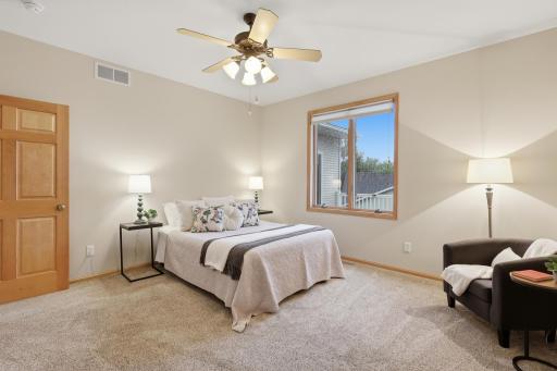 A spacious primary bedroom with a private en-suite offers comfort and convenience.